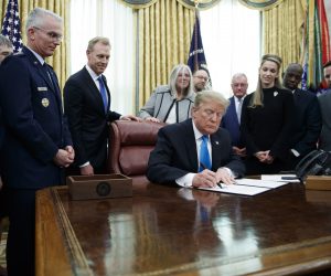 epa07381620 US President Donald J. Trump (C) participates in a signing ceremony for Space Policy Directive 4 in the Oval Office of the White House in Washington, DC, USA, 19 February 2019. The policy directive establishes the Space Force as the 6th branch of US armed forces operating within the department of the Air Force.  EPA/SHAWN THEW