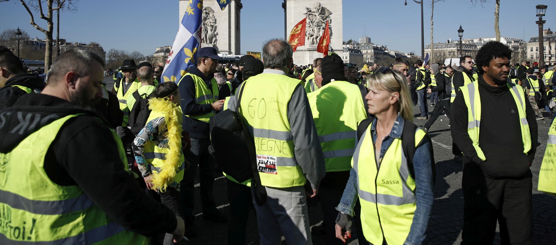 epa07389890 Protesters from the 'Gilets Jaunes' (Yellow Vests) movement gather at the Champs Elysees as they take part in the 'Act XV' demonstration (the 15th consecutive national protest on a Saturday) in Paris, France, 23 February 2019. The so-called 'gilets jaunes' (yellow vests) is a grassroots protest movement with supporters from a wide span of the political spectrum, that originally started with protest across the nation in late 2018 against high fuel prices. The movement in the meantime also protests the French government's tax reforms, the increasing costs of living and some even call for the resignation of French President Emmanuel Macron.  EPA/YOAN VALAT