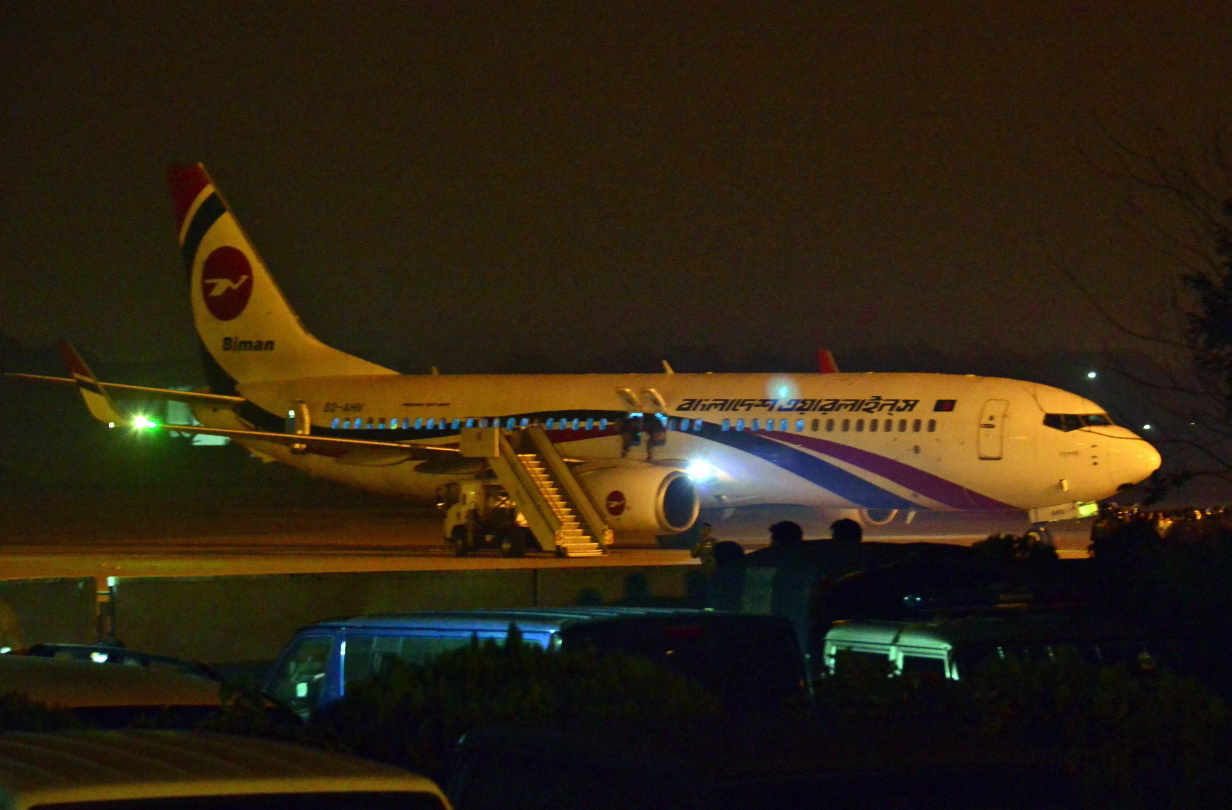epa07393027 The hijacked Dubai-bound Bangladesh Biman plane is seen at the tarmac after an emergency landing at the Shah Amanat International Airport in Chittagong, Bangladesh, 24 February 2019. According to the local media report national flag carrier bound for Dubai made an emergency landing and the passengers safely evacuated. A suspect has been arrested in the hijacking of a Biman Bangladesh Airlines plane at Chattogram’s Shah Amanat International Airport.  EPA/STR