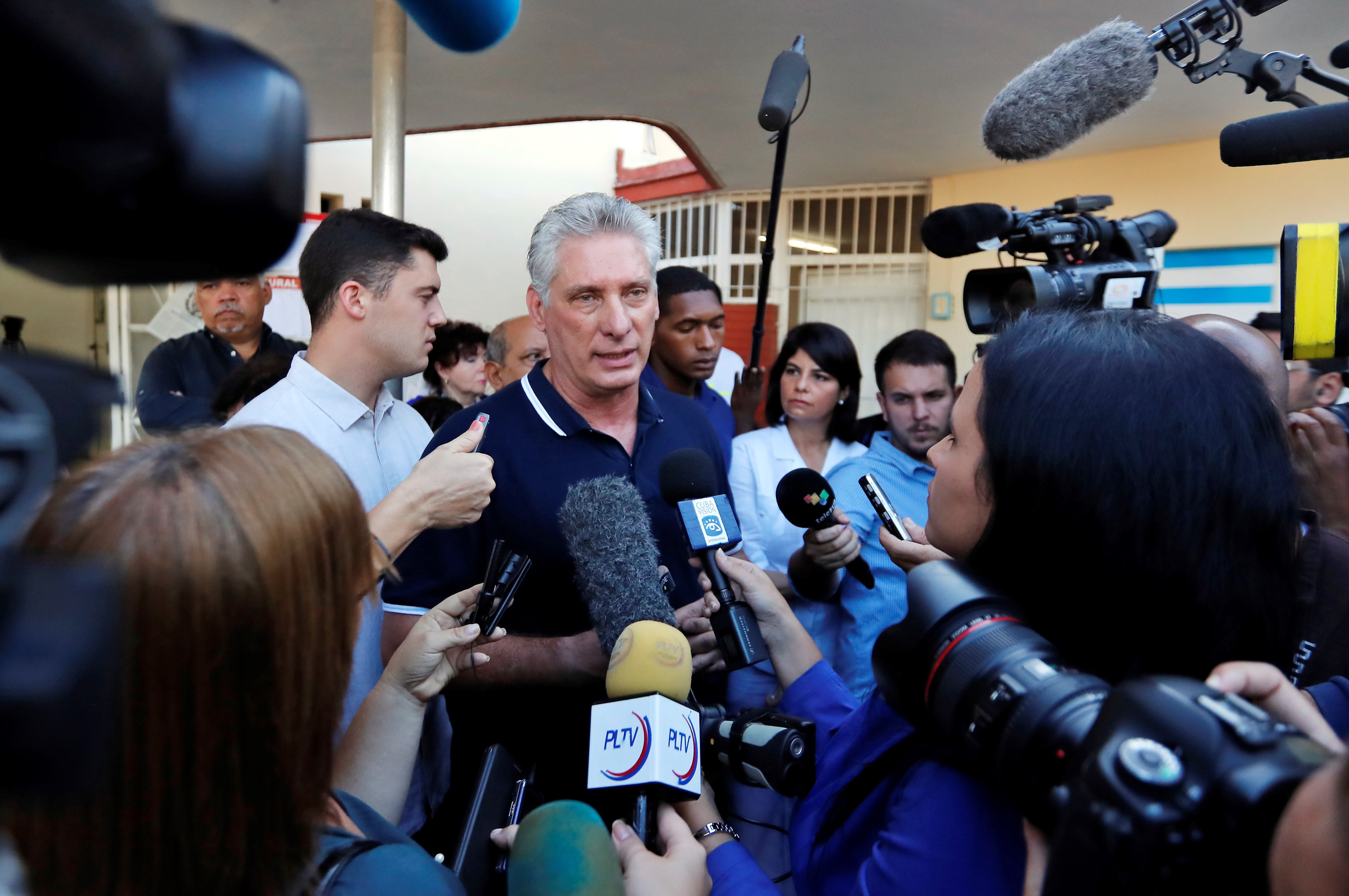 epa07393029 Cuban President Miguel Diaz-Canel delivers statements upon his arrival to an electoral college to vote in the referendum on the new Constitution, in Havana, Cuba, 24 February 2019. More than 25,000 polling stations opened their doors this Sunday in Cuba to vote in the referendum on the new Constitution - which ratifies communism and as a novelty recognizes private property - and to which more than eight million citizens are summoned.  EPA/ERNESTO MASTRASCUSA