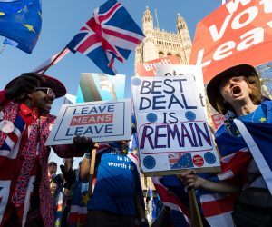 epa07401469 Brexit and anti Brexit protesters outside the Houses of Parliament in Westminster, central London, Britain, 27 February 2019. Members of Parliament (MPs) are debating and scheduled to vote on Theresa May's revised Brexit strategy later in the day.  EPA/VICKIE FLORES