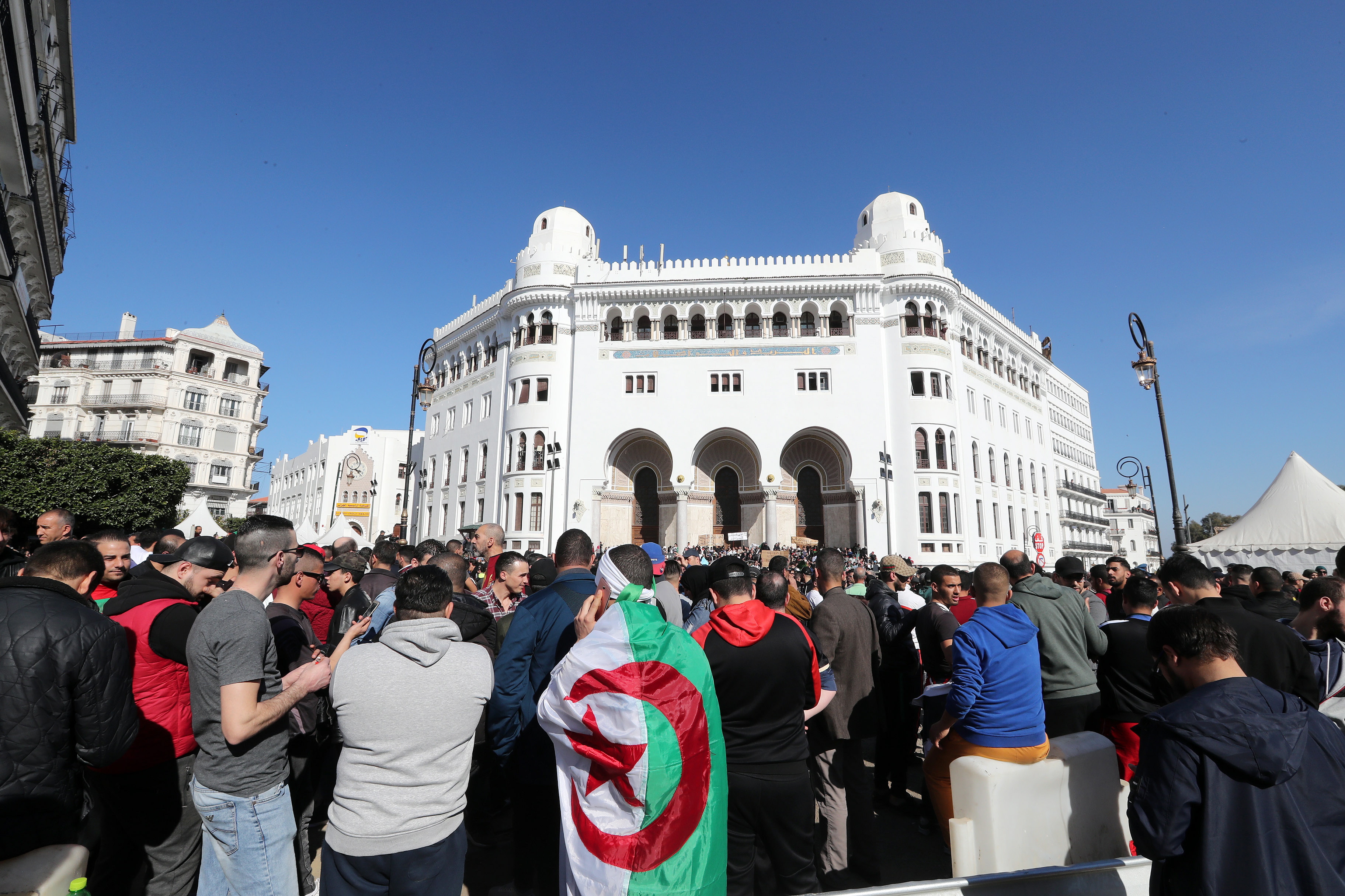 epa07406710 Algerian protesters chant slogans during a protest against the fifth term of Abdelaziz Bouteflika in Algiers, Algeria, 01 March 2019. Algerian authorities on 01 March braced for what are expected to be the largest protests in the Algerian capital in over a decade. Several protests and rallies were held in Algeria since Bouteflika serving as the president since 1999, announced he will be running for a fifth term in presidential elections scheduled for 18 April 2019.  EPA/MOHAMED MESSARA