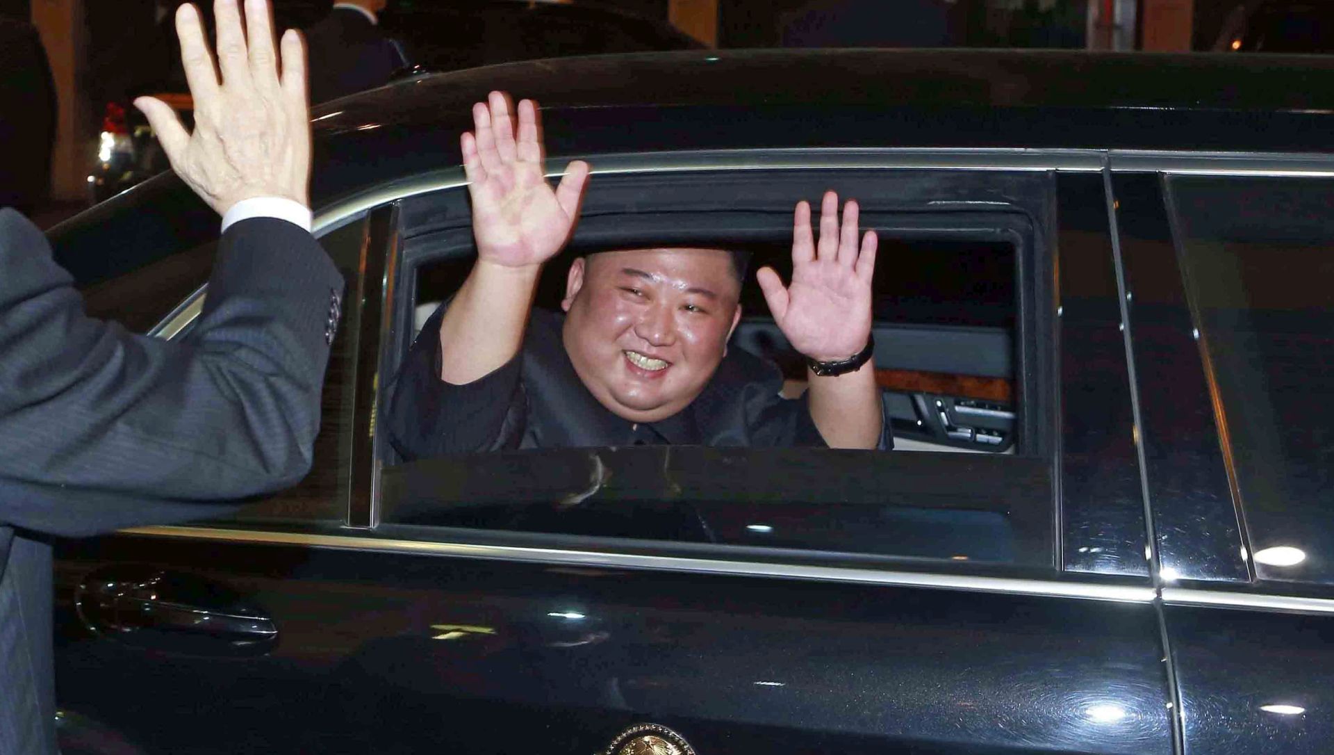 epa07407389 North Korean leader Kim Jong-un (R) waves goodbye to Vietnamese President Nguyen Phu Trong (L) following a state banquet in Hanoi, Veitnam 01 March 2019. Kim Jong-un is on a two-day official visit to Vietnam that will conclude on 02 March.  EPA/STRINGER -- VIETNAM OUT --  EDITORIAL USE ONLY