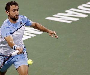 epa07416455 Marin Cilic of Croatia in action against David Goffin of Belgium in the first-ever Eisenhower Cup - a one-night Tie Break Tens event during the BNP Paribas Open tennis tournament at the Indian Wells Tennis Garden in Indian Wells, California, USA, 05 March 2019. The men's and women's final will be played on 17 March 2019.  EPA/LARRY W. SMITH