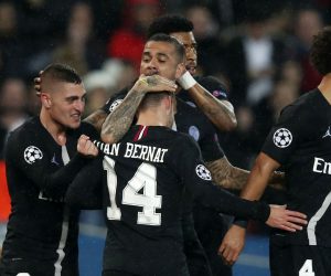 epa07418112 Paris Saint Germain's Juan Bernat celebrates with his teammates after scoring the equalizer during the UEFA Champions League round of 16 second leg soccer match between PSG and Manchester United at the Parc des Princes Stadium in Paris, France, 06 March 2019.  EPA/IAN LANGSDON