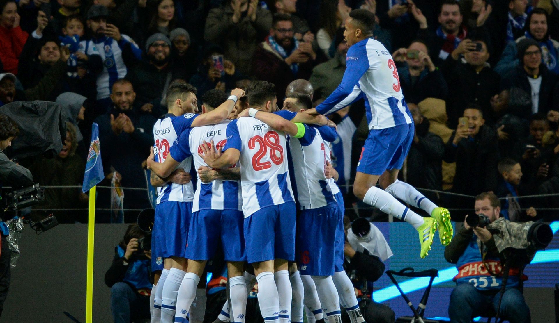 epa07418152 FC Porto's players celebrate a goal against Roma during their Champions League lround of 16 second leg soccer match, held at Dragao stadium, Porto, Portugal, 6 March 2019.  EPA/FERNANDO VELUDO