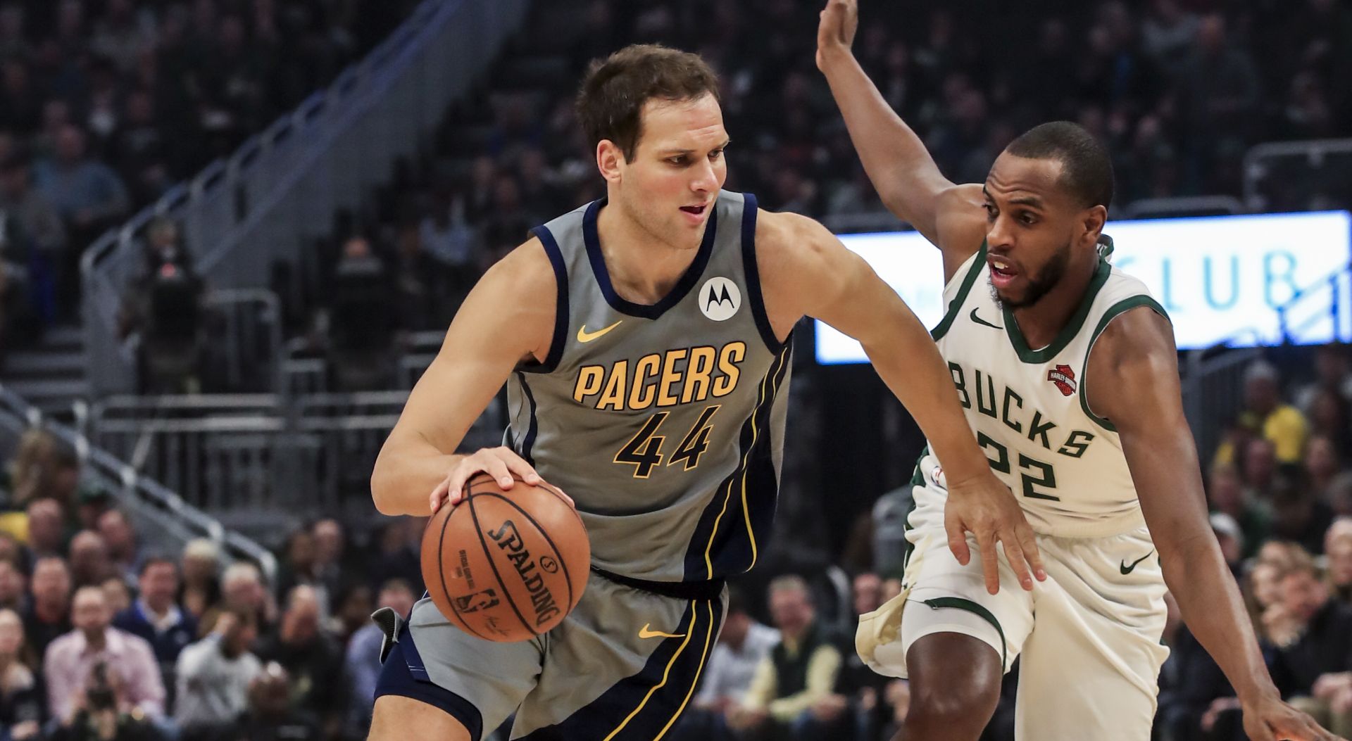 epa07421200 Indiana Pacers forward Bojan Bogdanovic of Croatia (L) drives around Milwaukee Bucks forward Khris Middleton (R) during the NBA game between the Indiana Pacers and the Milwaukee Bucks at Fiserv Forum in Milwaukee, Wisconsin, USA, 07 March 2019.  EPA/TANNEN MAURY  SHUTTERSTOCK OUT
