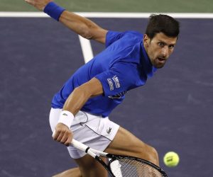 epa07426207 Novak Djokovic of Serbia in action against Bjorn Fratangelo of the US during the BNP Paribas Open tennis tournament at the Indian Wells Tennis Garden in Indian Wells, California, USA, 09 March 2019. The men's and women's final will be played on 17 March 2019.  EPA/JOHN G. MABANGLO