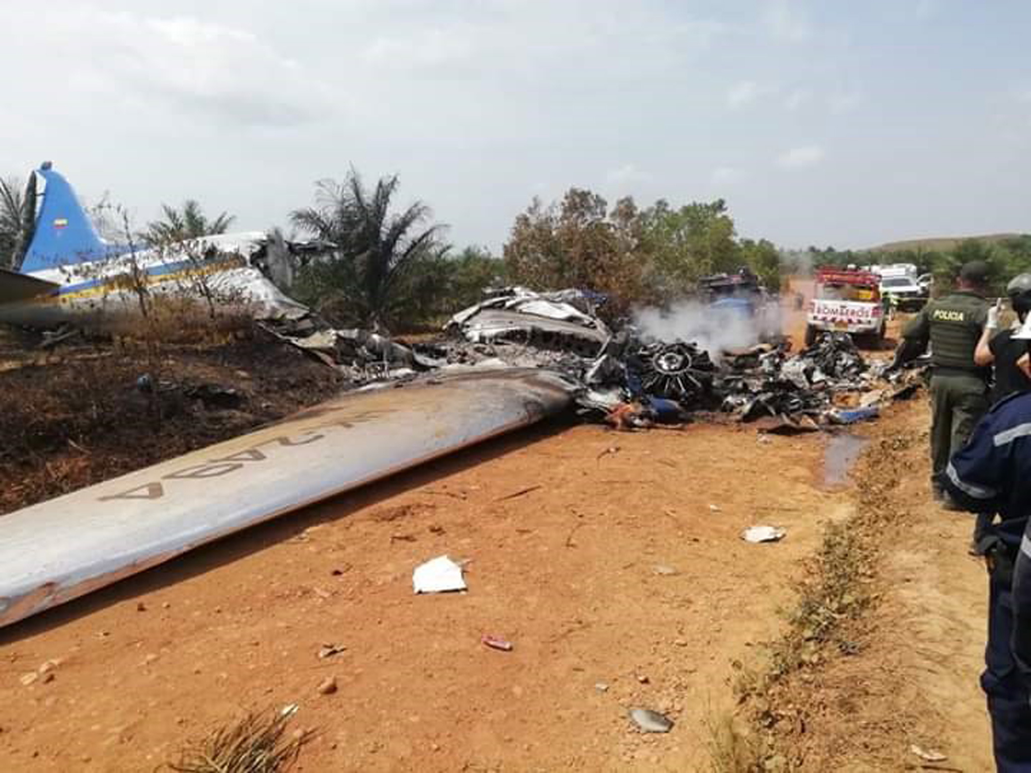 epa07426156 A handout photo made available by the Defensa Civil Colombiana shows the scene of an airplane accident in the village of La Bendicion, municipality of San Martin, Meta, Colombia, 09 March 2019. At least 14 people, including a minor, died when a DC-3 plane of the Laser airline crashed in a jungle area of the Colombian department of Meta.  EPA/DEFENSA CIVIL COLOMBIANA HANDOUT BEST QUALITY AVAILABLE HANDOUT EDITORIAL USE ONLY/NO SALES