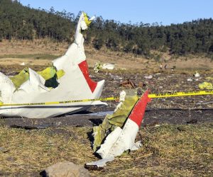 epa07427607 Wreckage lies at the crash site of Ethiopia Airlines Boeing 737 Max 8 en route to Nairobi, Kenya, near Bishoftu, Ethiopia, 10 March 2019. All passengers onboard the scheduled flight ET 302 carrying 149 passengers and 8 crew members, have died, the airlines says.  EPA/STR