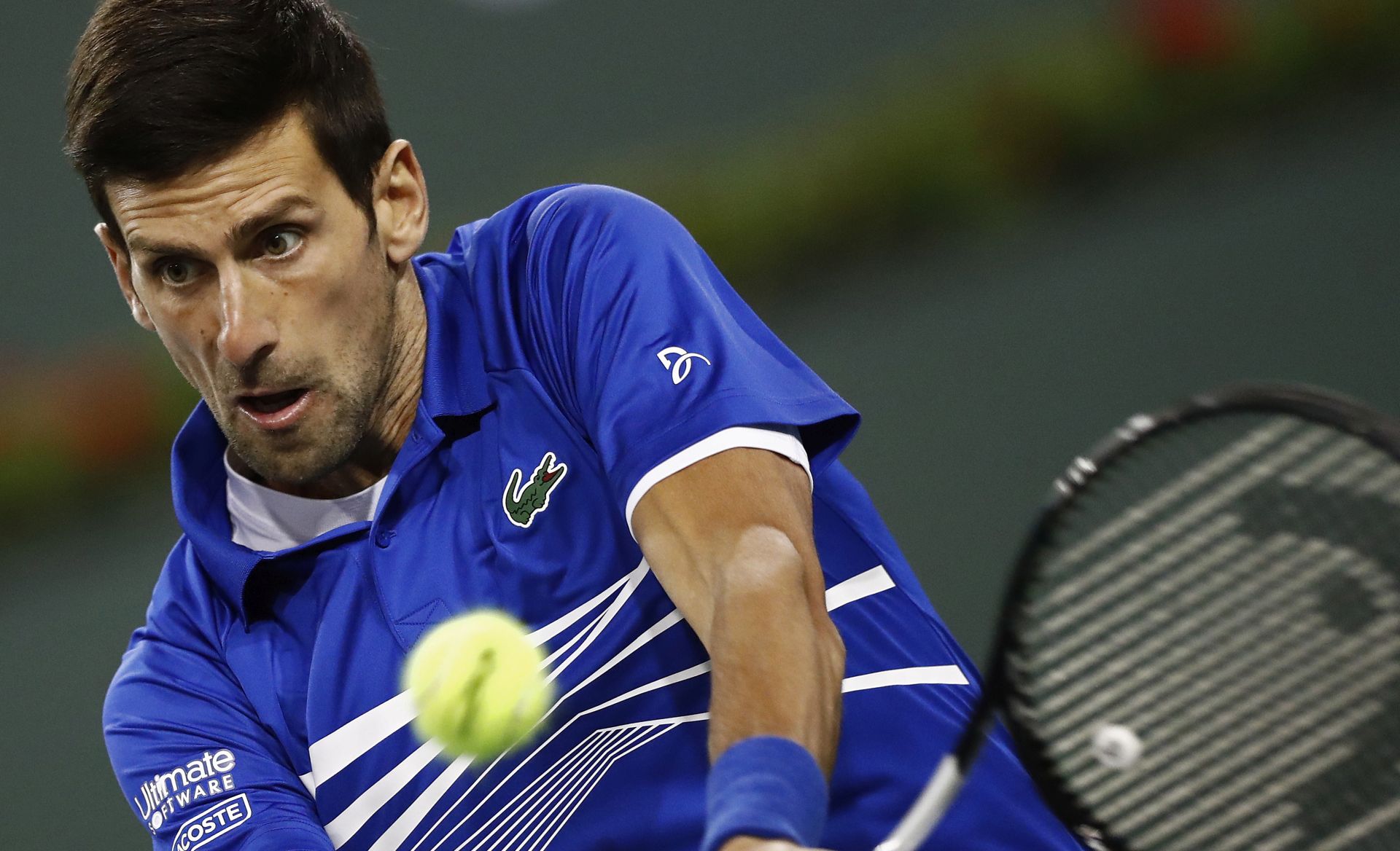 epa07430159 Novak Djokovic of Serbia in action against Philipp Kohlschreiber of Germany during the BNP Paribas Open tennis tournament at the Indian Wells Tennis Garden in Indian Wells, California, USA, 11 March 2019. The men's and women's final will be played, 17 March 2019.  EPA/LARRY W. SMITH