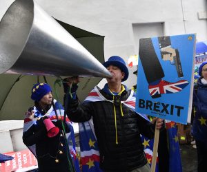 epa07431596 Pro-remain protesters rally outside parliament in London, Britain, 12 March 2019. British parliament will vote on British Prime Minister May's amended Brexit deal later in the day. Theresa May wants parliament to back her 'improved' withdrawal agreement she has negotiated with the EU over the so-called 'backstop'. The United Kingdom is officially due to leave the European Union on 29 March 2019, two years after triggering Article 50 in consequence to a referendum.  EPA/NEIL HALL