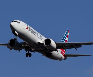 epa07432162 An American Airlines Boeing 737 Max 8 (Tail Number N323RM) lands at LaGuardia Airport in New York, New York, USA, 12 March 2019. Multiple countries around the world have ground the Boeing 737 Max 8 planes following two separate crashes involving the model.  EPA/JUSTIN LANE