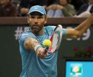 epa07435411 Ivo Karlovic of Croatia in action against Dominic Thiem of Austria during the BNP Paribas Open tennis tournament at the Indian Wells Tennis Garden in Indian Wells, California, USA, 13 March 2019. The men's and women's final will be played, 17 March 2019.  EPA/JOHN G. MABANGLO