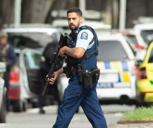 epa07438401 Armed police patrol following a shooting resulting in multiply fatalies and injuries at the Masjid Al Noor on Deans Avenue in Christchurch, New Zealand, 15 March 2019. According to media reports on 15 March 2019, at least one gunman opened fire at around 1:40 pm local time after walking into the Masjid Al Noor Mosque, killing and wounding several of people. Armed police officers were deployed to the scene, along with emergency service personnel. There are also confirmed reports of a shooting at a second mosque in Christchurch, and both incidents have left at least 40 people dead and more than 20 people seriously wounded. Four people are in custody in connection with the shootings.  EPA/Martin Hunter NEW ZEALAND OUT