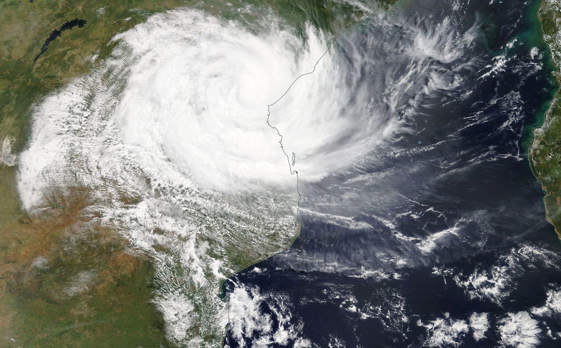 epa07439646 A handout photo made available by the NASA shows a Terra/MODIS satellite image of cyclone Idai as it hits Mozambique, 15 March 2019. Cyclone Idai made landfall in Mozambique.  EPA/NASA WORLDVIEW / HANDOUT  HANDOUT EDITORIAL USE ONLY/NO SALES