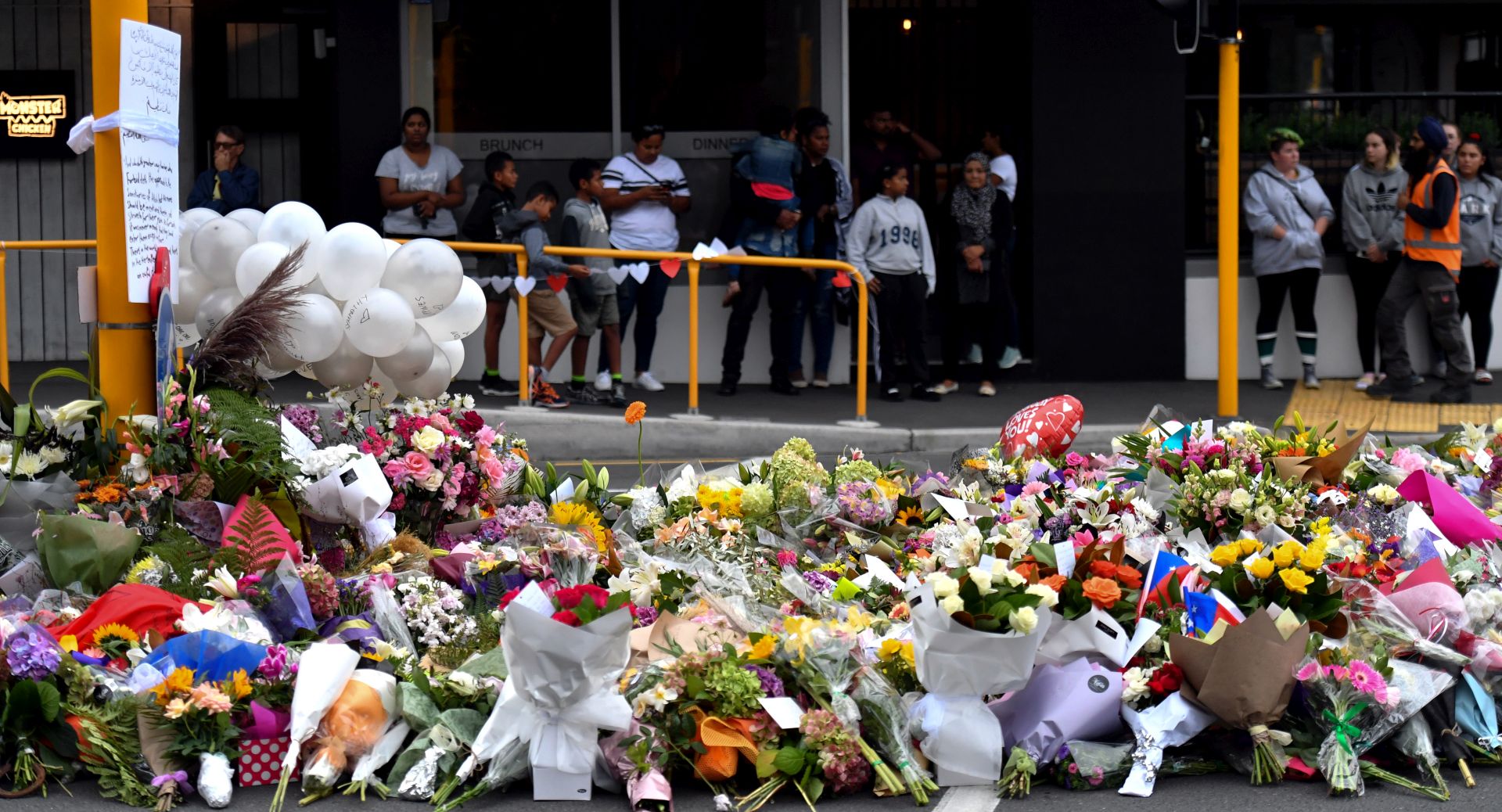epa07441310 A makeshift memorial near the Al Noor Masjid on Deans Rd in Christchurch, New Zealand, 16 March 2019. A gunman killed 49 worshippers at the Al Noor Masjid and Linwood Masjid on 15 March. The 28-year-old Australian suspect, Brenton Tarrant, appeared in court on 16 March and was charged with murder.  EPA/MICK TSIKAS  AUSTRALIA AND NEW ZEALAND OUT