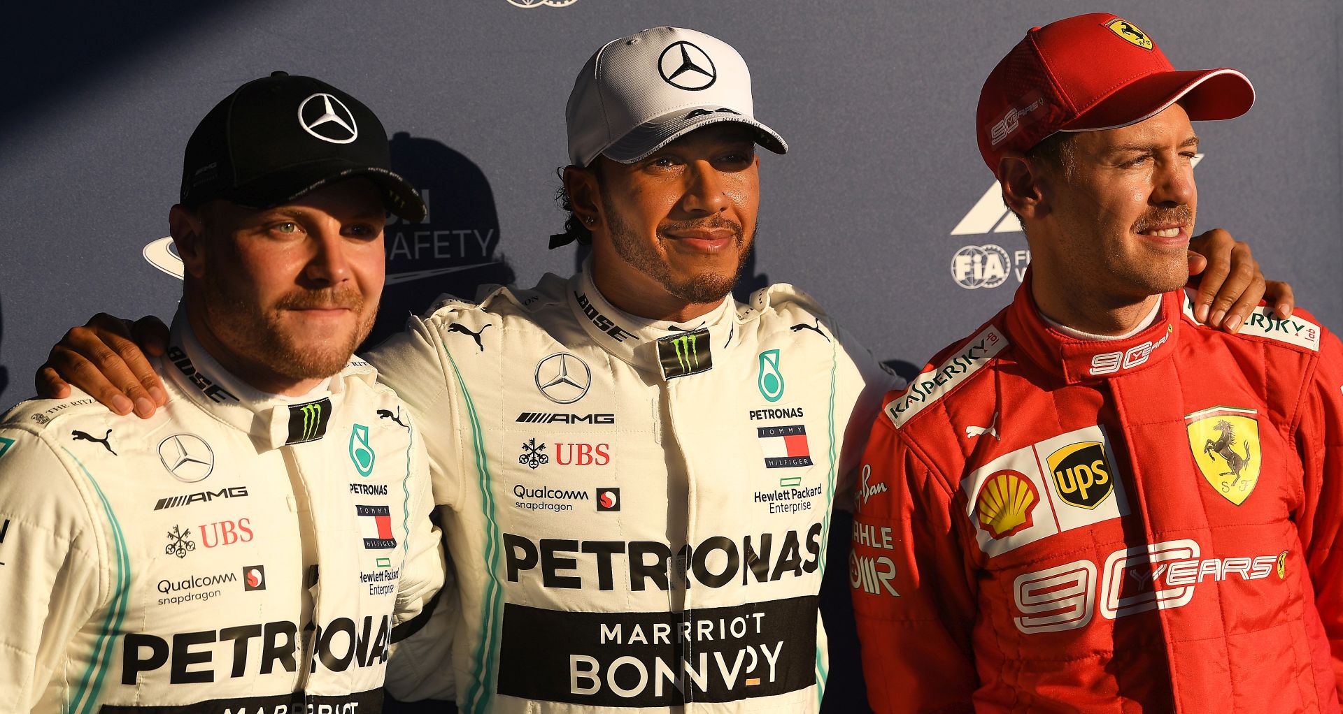 epa07441481 (L-R) Valtteri Bottas of Finland, Lewis Hamilton of Great Britain and Sebastian Vettel of Germany are seen after qualifying first, second and third respectivley after the qualifying session for the 2019 Formula One Grand Prix of Australia at the Albert Park Grand Prix Circuit in Melbourne, Australia, 16 March 2019. The 2019 Formula One Grand Prix of Australia will take place on 17 March 2019.  EPA/JULIAN SMITH AUSTRALIA AND NEW ZEALAND OUT