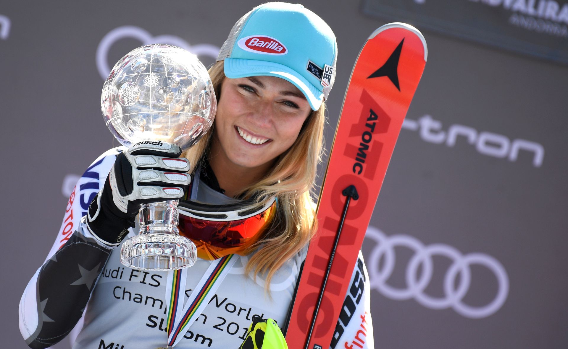 epa07442197 Mikaela Shiffrin of US celebrates on the podium  with her Women's Slalom World Cup trophy at the FIS Alpine Skiing World Cup finals in Soldeu - El Tarter, Andorra, 16 March 2019.  EPA/CHRISTIAN BRUNA