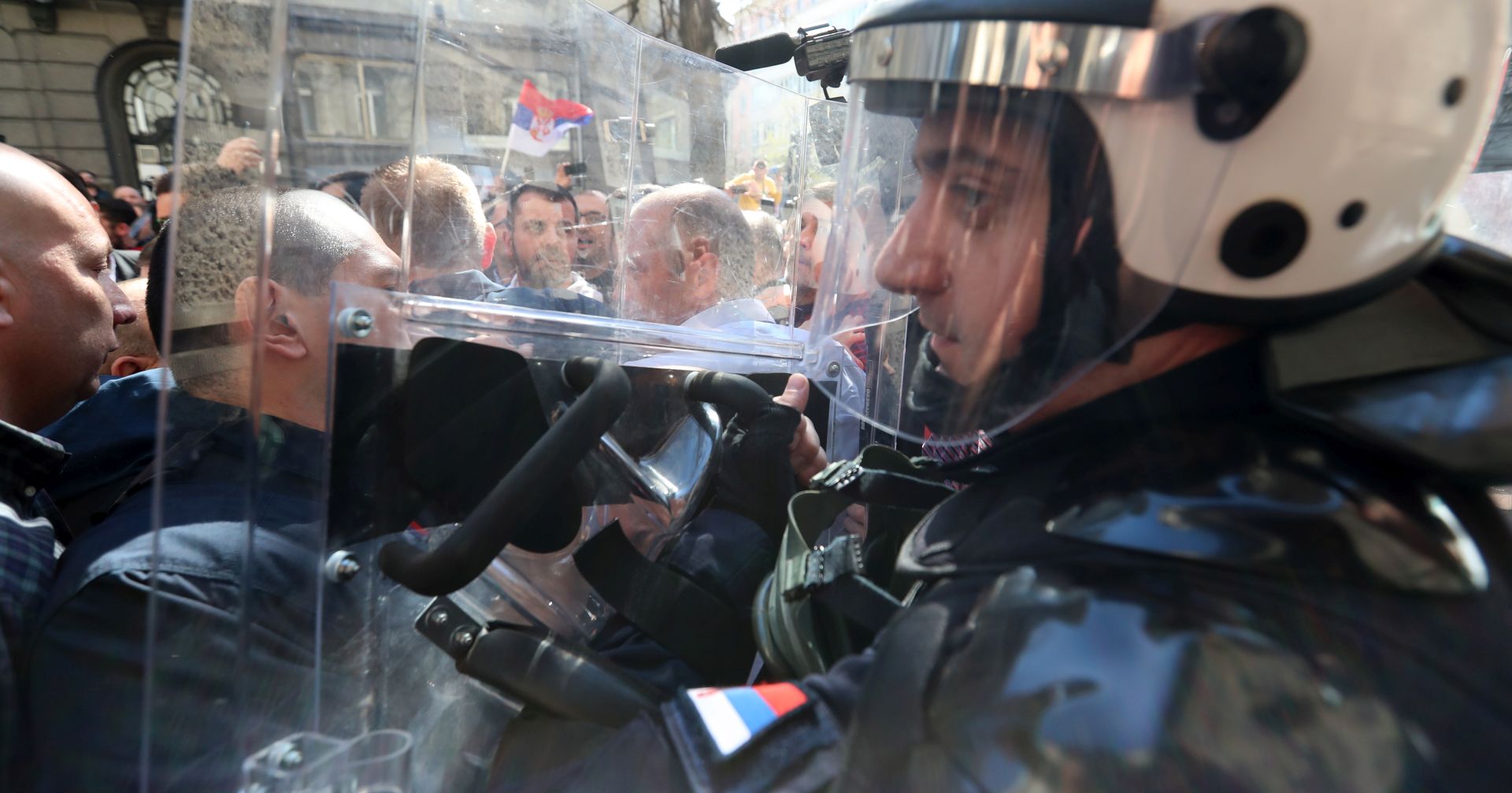 epa07444535 Riot policeman stand guard in front of the office of the President of Serbia in Belgrade, Serbia, 17 March 2019. Thousands of people protested in Serbia against the President Aleksandar Vucic over what they say has been a smothering of democratic freedoms under his government.  EPA/SRDJAN SUKI