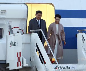 epa07454094 Chinese President Xi Jinping (L) and his wife Peng Liyuan (R) arrive at Rome's Leonardo Da Vinci airport in Fiumicino, Rome, Italy, 21 March 2019. Jinping is in Italy to sign a memorandum of understanding to make Italy the first Group of Seven leading democracies to join China's ambitious Belt and Road infrastructure project.  EPA/STR