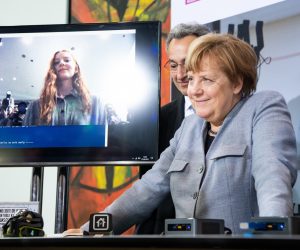 27 March 2019, Berlin: German Chancellor Angela Merkel (R) and President of Initiative D21 Hannes Schwaderer (L), attend the opening of 19th Girls' Day at the German Chancellery. Photo: Bernd von Jutrczenka/dpa