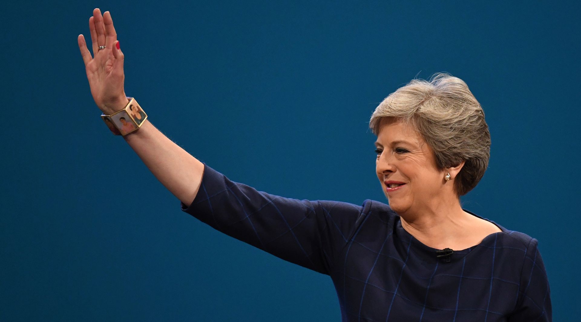 epa07467341 (FILE) - Britain's Prime Minister Theresa May waves to delegates as she delivers her speech on the final day of Conservative Party Conference in Manchester, Britain, 04 October 2017 (reissued 27 March 2019). According to reports, British Prime Minister Theresa May on 27 March 2019 promised MPs of her Conservative party that she will step down from her office, as British parliament is holding indicative votes in the course of the evening.  EPA/FACUNDO ARRIZABALAGA *** Local Caption *** 53808979