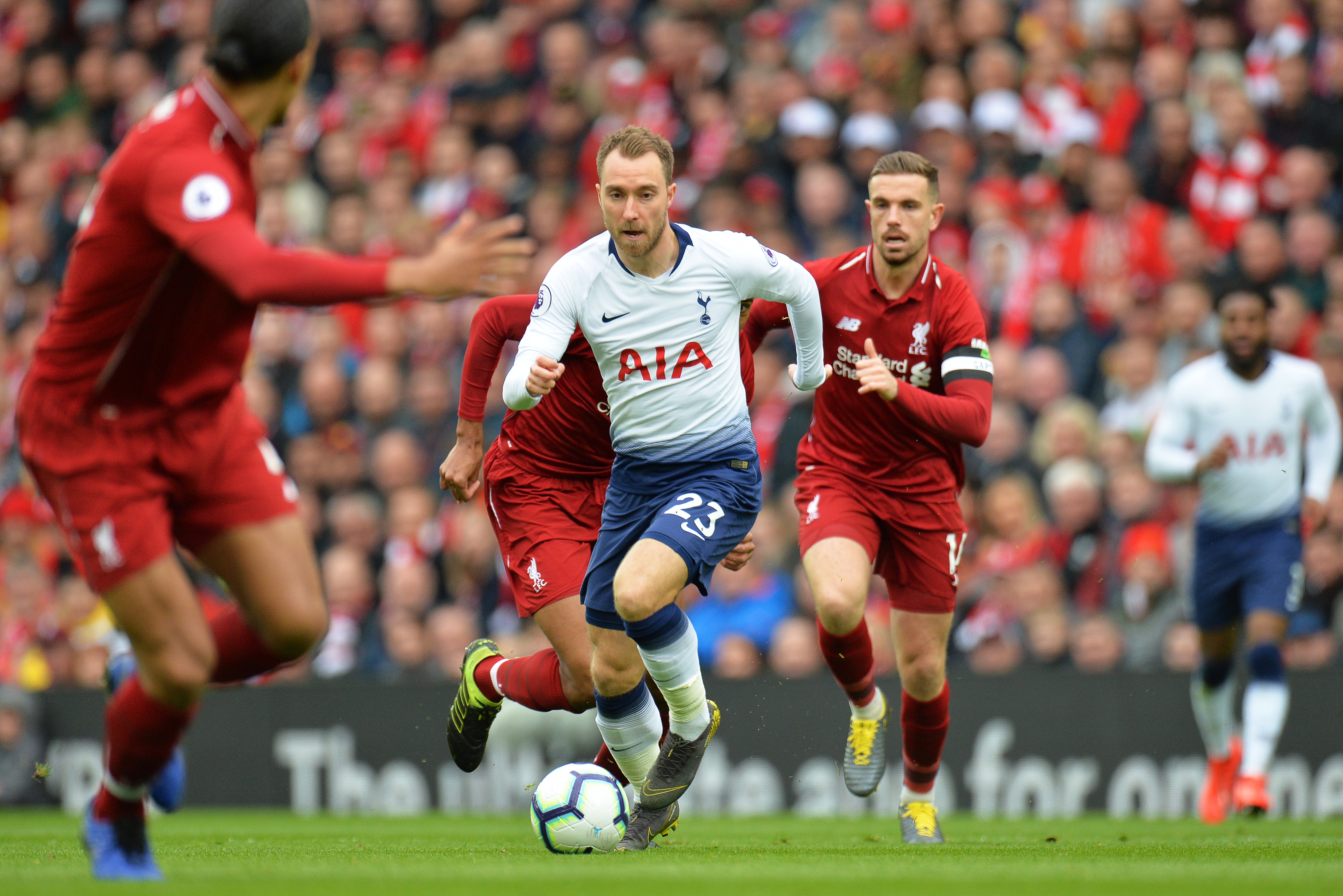 epa07476701 Liverpool's captain Jordan Henderson (R) in action against Tottenham's Christian Eriksen (L) during the English Premier League soccer match between Liverpool FC and Tottenham Hotspur at Anfield in Liverpool, Britain, 31 March 2019.  EPA/PETER POWELL EDITORIAL USE ONLY. No use with unauthorized audio, video, data, fixture lists, club/league logos or 'live' services. Online in-match use limited to 120 images, no video emulation. No use in betting, games or single club/league/player publications