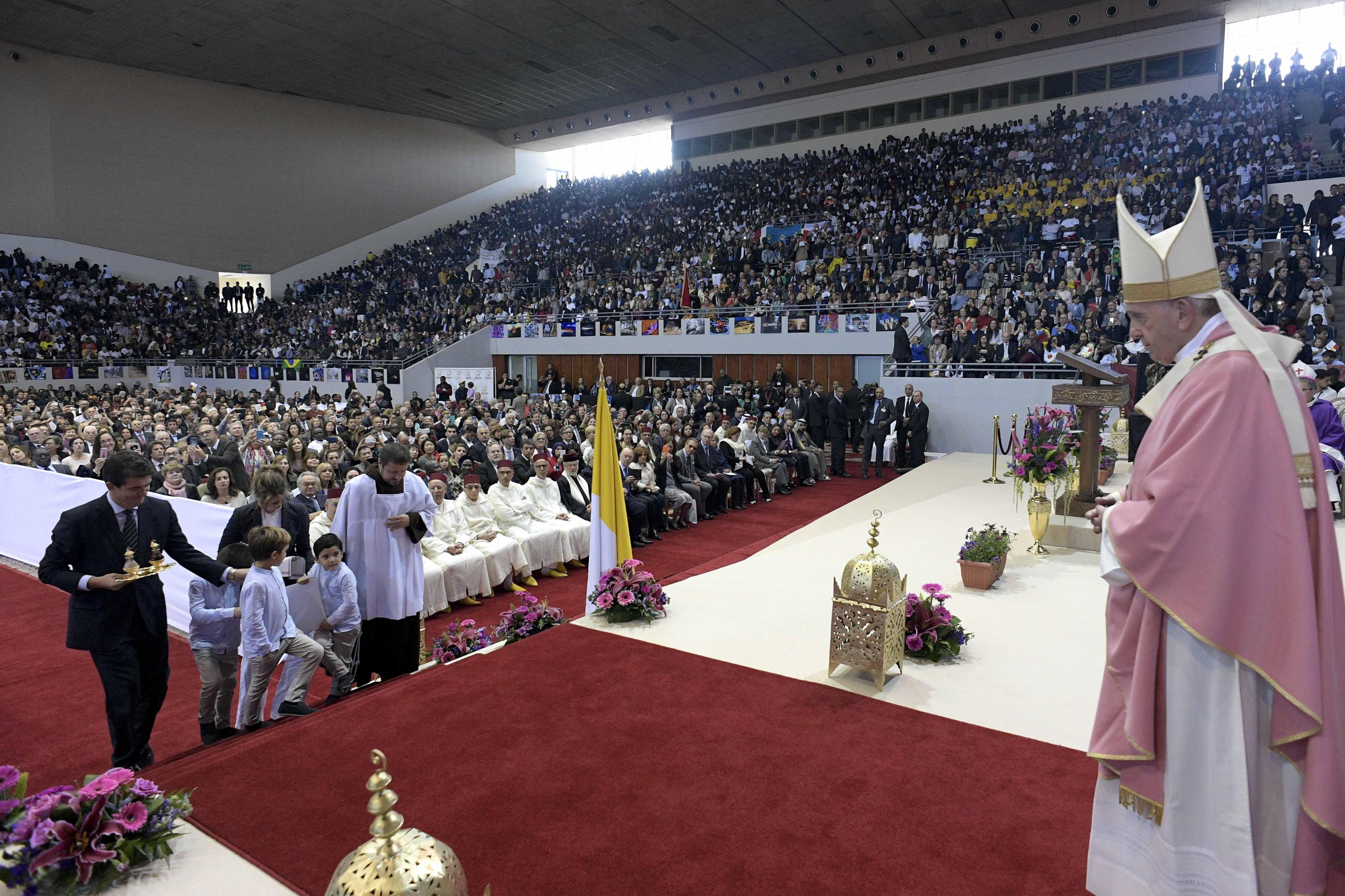 epa07476729 A handout picture provided by the Vatican Media shows Pope Francis during a Mass at Prince Moulay Abdellah Stadium in Rabat, Morocco, 31 March 2019. Pope Francis is on the apostolic journey to Morocco to highlight the North African nation's tradition of Christian-Muslim ties.  EPA/VATICAN MEDIA HANDOUT  HANDOUT EDITORIAL USE ONLY/NO SALES