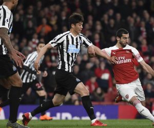 epa07479211 Arsenal's Henrikh Mkhitaryan (R) vies for the ball against Newcastle Uniteds's Ki Sung-yueng (C) during the English Premier League soccer match between Arsenal and Newcastle United at Emirates Stadium, London, Britain, 01 April 2019.  EPA/WILL OLIVER EDITORIAL USE ONLY. No use with unauthorized audio, video, data, fixture lists, club/league logos or 'live' services. Online in-match use limited to 120 images, no video emulation. No use in betting, games or single club/league/player publications