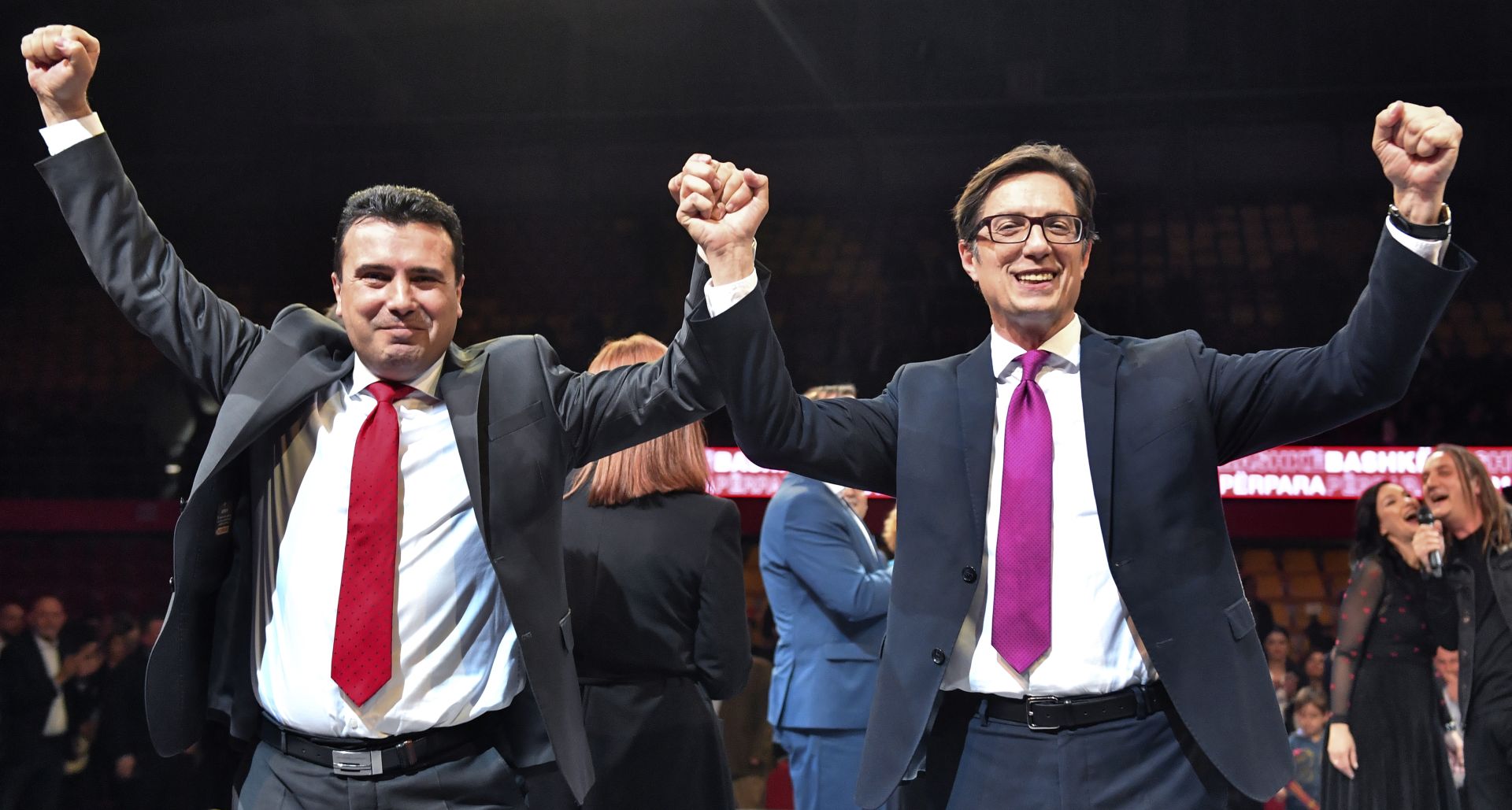 epa07483515 The Prime Minister and leader of the ruling Social Democrats, Zoran Zaev (L) and Stevo Pendarovski (R) presidential candidate greet their supporters on a party convention in Skopje, North Macedonia, 03 April 2019. The coalition between the ruling SDSM and DUI will run in the upcoming Presidential election with Professor Stevo Pendarovski who is a candidate for the President of the Republic of North Macedonia for the second time. The first round of the election is scheduled for 21 April 2019.  EPA/GEORGI LICOVSKI