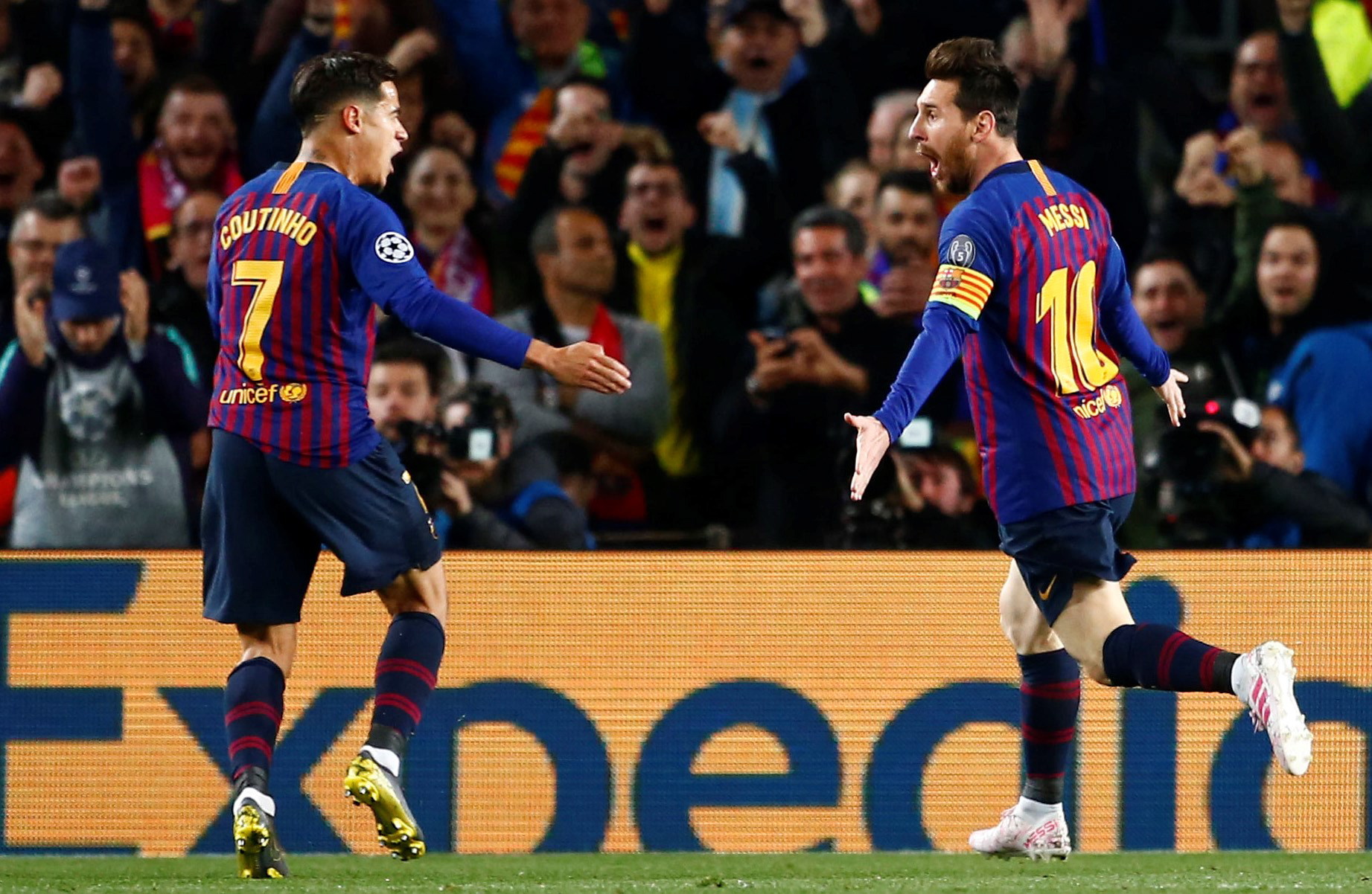 epa07510799 FC Barcelona's forward Leo Messi (R) celebrates with his teammate Philippe Coutinho (L) after scoring the 1-0 during the UEFA Champions League quarter-final second leg match between FC Barcelona and Manchester United at Camp Nou stadium in Barcelona, Catalonia, Spain, 16 April 2019.  EPA/Enric Fontcuberta