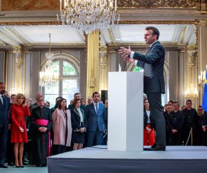 epa07513802 French President Emmanuel Macron (C) delivers a speech for the Parisian Firefighters' brigade and security forces who took part at the fire extinguishing operations during the Notre Dame of Paris Cathedral fire, at Elysee Palace in Paris, France, 18 April 2019. A fire of which cause is still not established, ravaged Notre Dame of Paris Cathedral, one of the most visited monuments of the French capital, on 15 April.  EPA/CHRISTOPHE PETIT TESSON / POOL