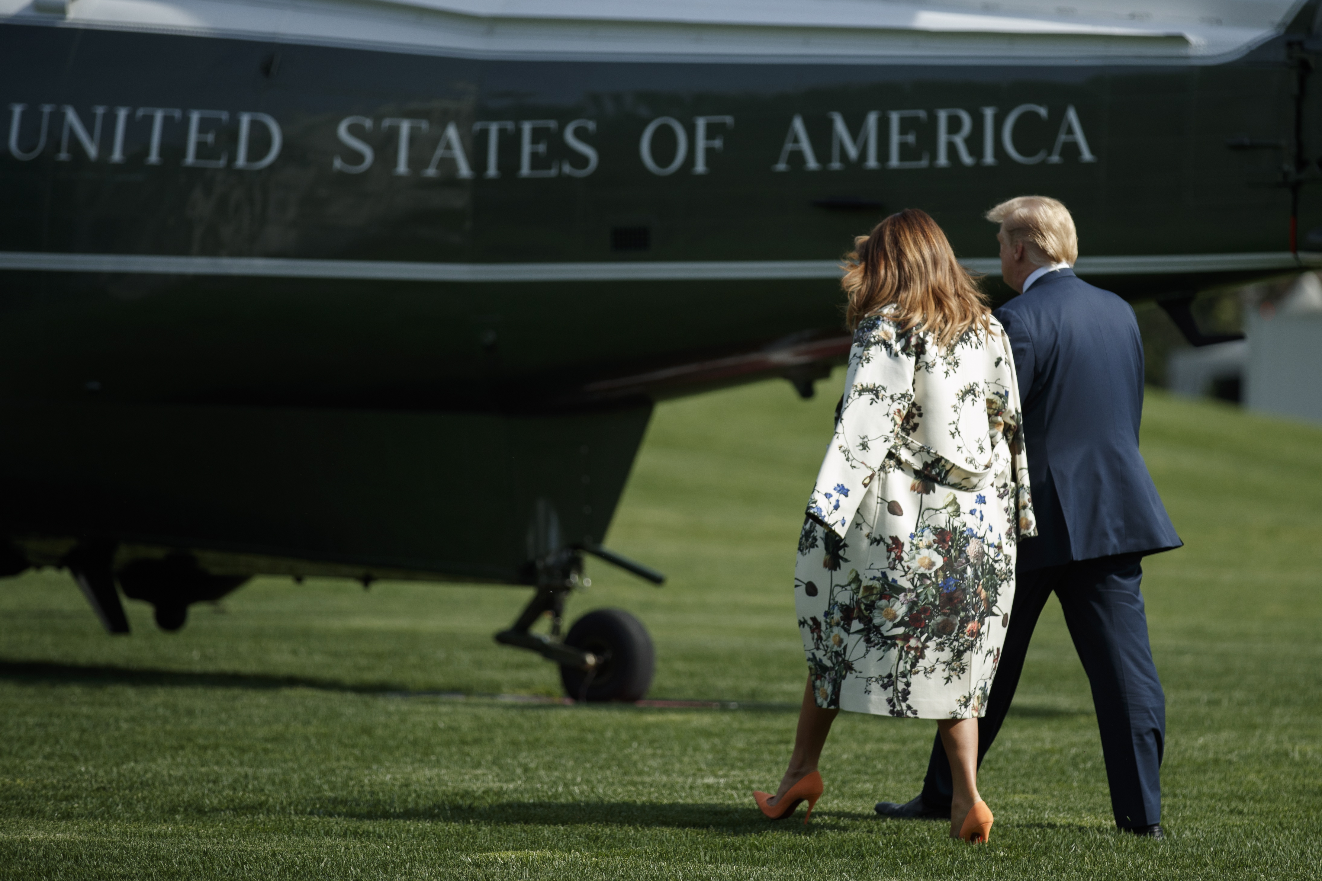 epa07514859 US President Donald J. Trump and First Lady Melania Trump walk to board Marine One one without taking questions from the news media on the South Lawn of the White House in Washington, DC, USA, 18 April 2019. The Mueller report, released today, states the special counsel's office found no evidence of collusion with the Russian government, but does not state a conclusion about obstruction of justice.  EPA/SHAWN THEW