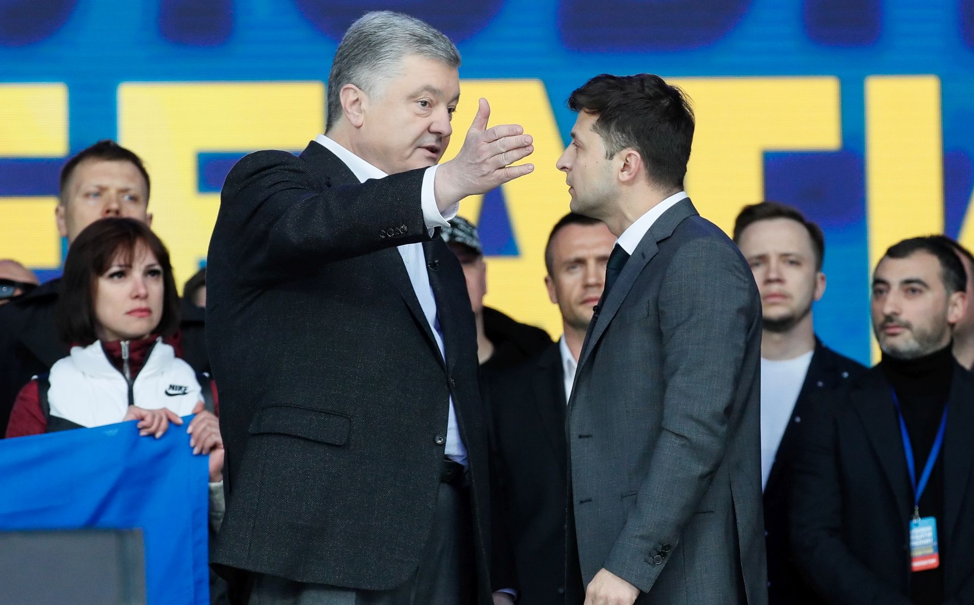 epa07516268 Ukrainian Presidential candidates Petro Poroshenko (L) and Volodymyr Zelensky (R) attend their debates at the Olimpiyskiy Stadium in Kiev, Ukraine, 19 April 2019.  Presidential candidates Petro Poroshenko and Volodymyr Zelensky visit the Olimpiyskiy Stadium to take part in the debates ahead of the second round of the presidential elections which will be held on 21 April 2019. After the first round of elections, showman Volodymyr Zelensky remains a frontrunner with 30.24 percent of votes and incumbent president Petro Poroshenko is a runner-up with 15.95 percent of votes.  EPA/SERGEY DOLZHENKO