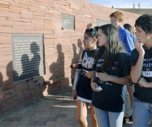 epa07515929 (FILE) - Columbine High School students read the plaques at the newly dedicated Columbine Memorial at Clement Park in Littleton, Colorado, USA, 21 September 2007 (reissued 19 April 2019). Twelve students and one teacher were killed by two student gunmen at Columbine high school adjacent to Clement Park April 20, 1999.  EPA/RICK GIASE *** Local Caption *** 01127692