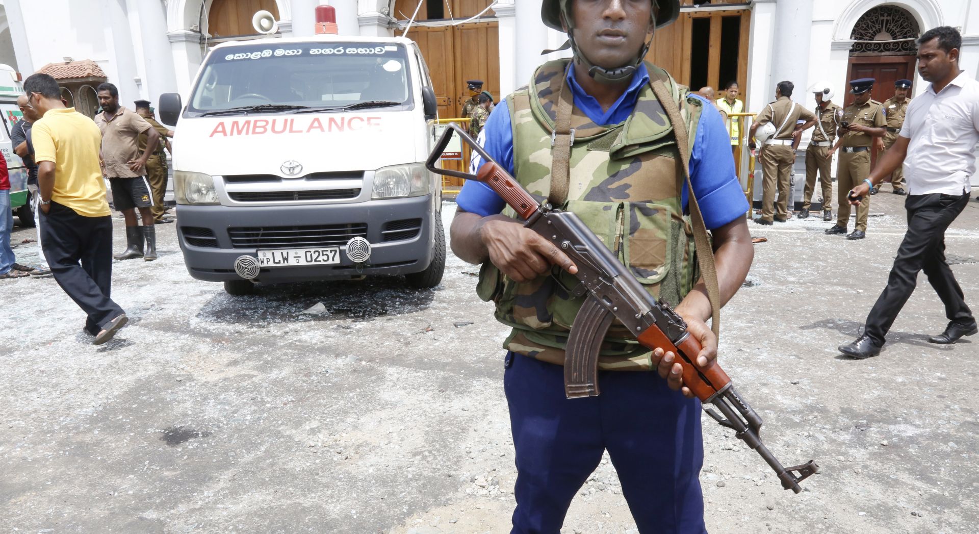 epa07518769 Security personal stand guard after a explosion hit at St Anthony's Church in Kochchikade in Colombo, Sri Lanka, 21 April 2019. According to the news reports at least 25 people killed and over 200 injured in a series of blasts during the Easter Sunday service at St Anthony's Church in Kochchikade and explosions also reported at the Shangri-La Hotel and Kingsbury Hotel.  EPA/M.A. PUSHPA KUMARA