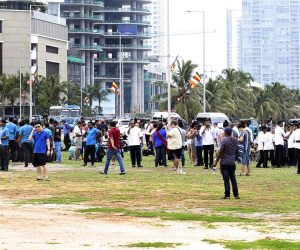epa07519449 Hotel staffs and guests gather in the open after an explosion hit Shangri-La Hotel  in Colombo, Sri Lanka, 21 April 2019.  According to news reports at least 138 people killed and over 400 injured in a series of blasts during the Easter Sunday service at St Anthony's Church in Kochchikade, Shangri-La Hotel and Kingsbury Hotel with many more places.  EPA/M.A. PUSHPA KUMARA
