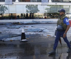epa07520985 Sri Lankan Security personal pass the damaged Kingsbury Hotel, where a fatal blast occured the day before, in Colombo, Sri Lanka, 22 April 2019. According to news reports, at least 290 people have been killed and over 500 were injured on 21 April 2019 in a series of blasts during Easter Sunday service at churches and at hotels across Colombo.  EPA/M.A. PUSHPA KUMARA