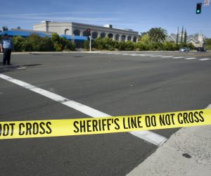 epa07533125 A view of police tape at an intersection next to the Chabad of Poway synagogue where a gunman opened fire earlier in the day killing one person and injuring three, in Poway, California, USA, 27 April 2019. According to media reports, a 19-year-old man was arrested after the attack.  EPA/David Maung