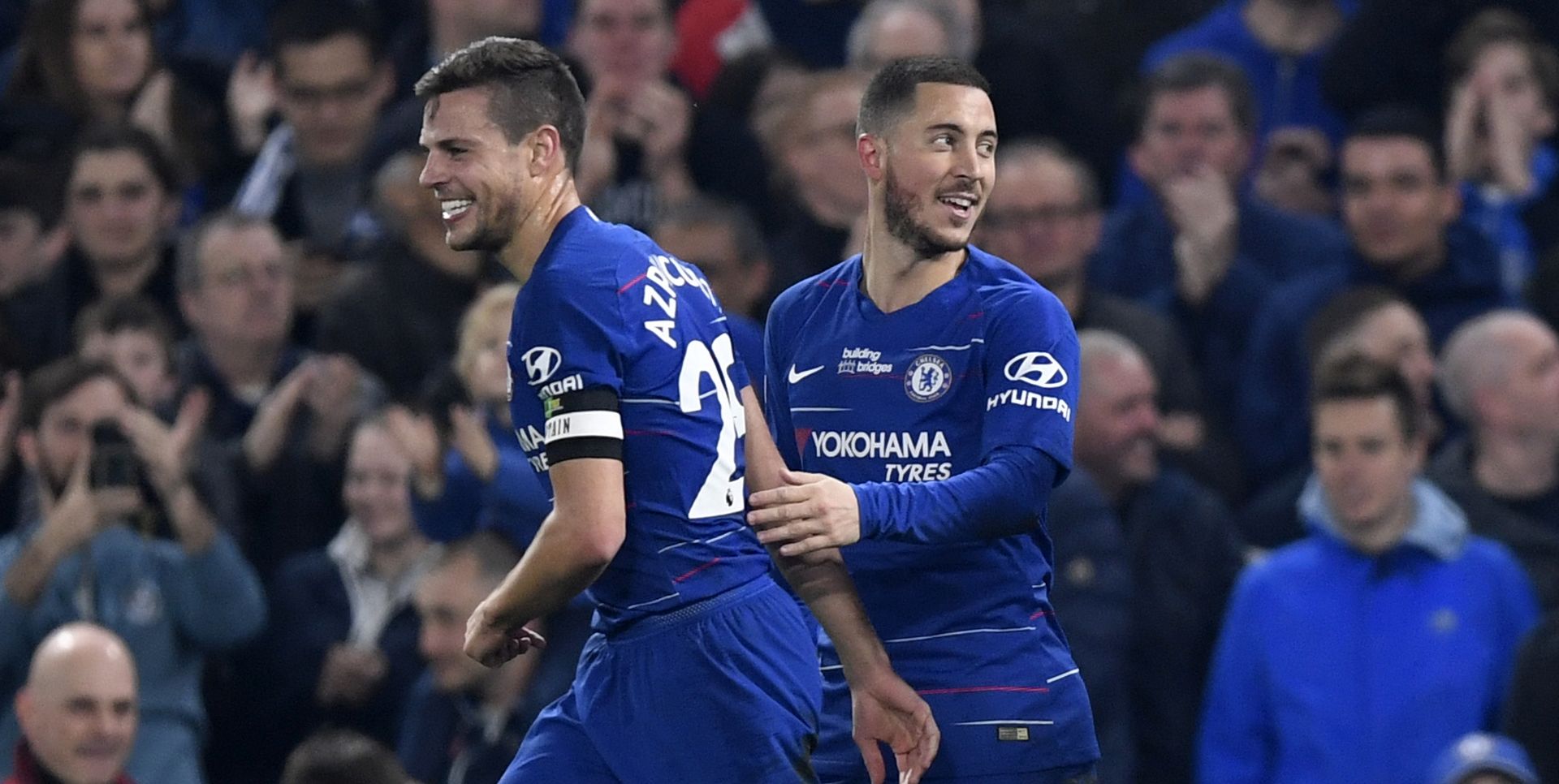 epa07492837 Chelsea's Eden Hazard (R) celebrates after scoring during the English Premier League soccer match between Chelsea and West Ham United at Stamford Bridge Stadium, London, Britain, 08 April 2019.  EPA/WILL OLIVER EDITORIAL USE ONLY. No use with unauthorized audio, video, data, fixture lists, club/league logos or 'live' services. Online in-match use limited to 120 images, no video emulation. No use in betting, games or single club/league/player publications