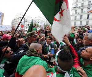 epa07515388 Algerian protesters shout slogans during a demonstration demanding for the departure of the entire Algerian regime, in Algiers, Algeria, 19 April 2019. The Algerians protests that began in early February 2019, after former president Abdelaziz Bouteflika announced his candidacy for a fifth presidential term, continue to call for radical change of the system.  EPA/MOHAMED MESSARA