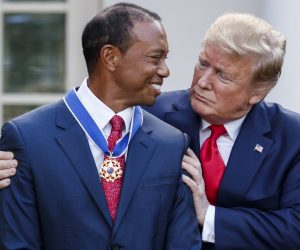 epaselect epa07552091 US President Donald J. Trump (R) awards golfer Tiger Woods (L) the Presidential Medal of Freedom during a ceremony in the Rose Garden of the White House in Washington, DC, USA, 06 May 2019. After winning the Masters President Trump tweeted that he would award Woods the Presidential Medal of Freedom.  EPA/SHAWN THEW