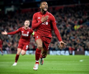 epa07554591 Liverpool's Georginio Wijnaldum celebrates after scoring the 3-0 goal during the UEFA Champions League semi final second leg soccer match between Liverpool FC and FC Barcelona at Anfield stadium in Liverpool, Britain, 07 May 2019.  EPA/PETER POWELL