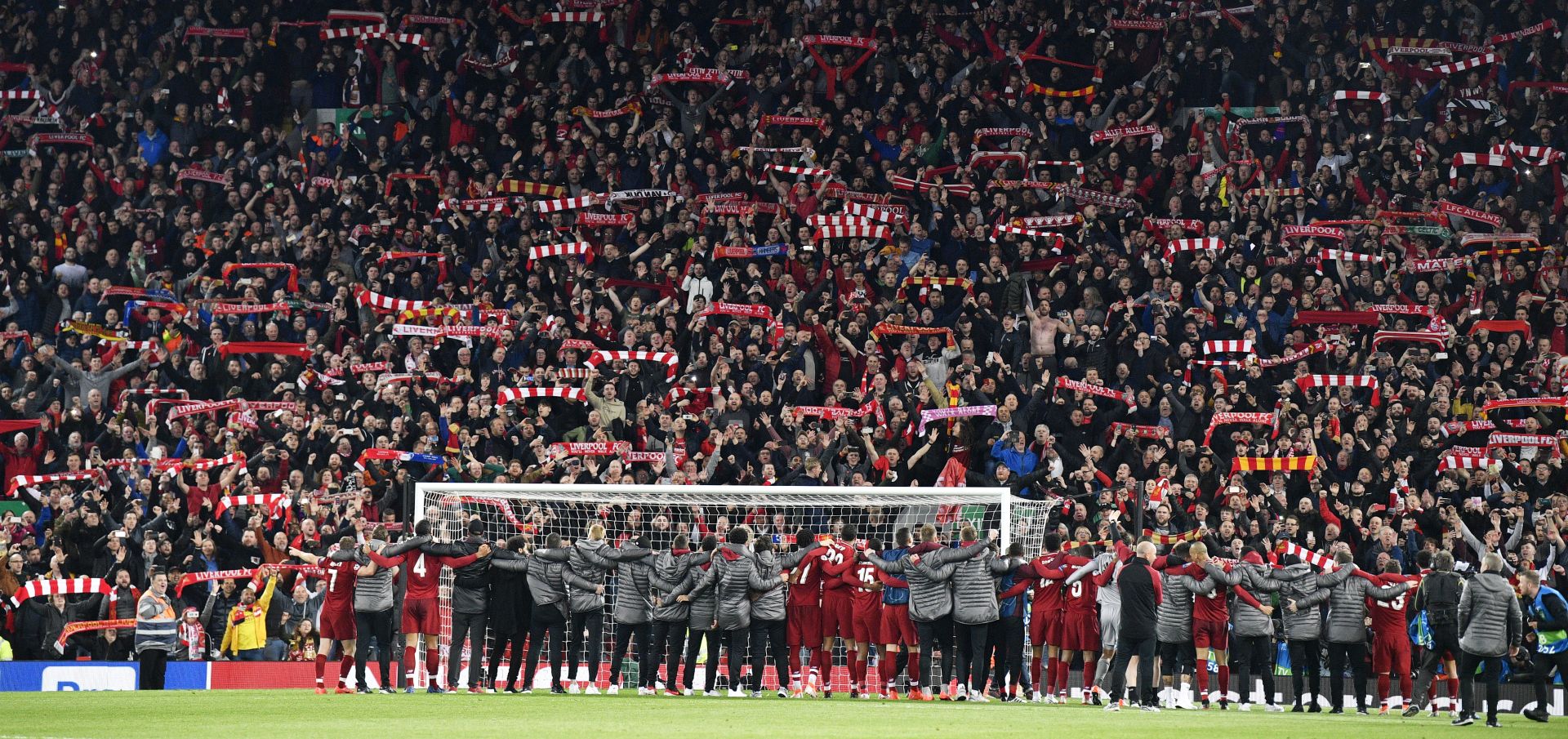 epa07554701 Liverpool players celebrate in front of their fans after the UEFA Champions League semi final 2nd leg match between Liverpool FC and FC Barcelona at Anfield, Liverpool, Britain, 07 May 2019. Liverpool won 4-0 and advance to the final.  EPA/NEIL HALL
