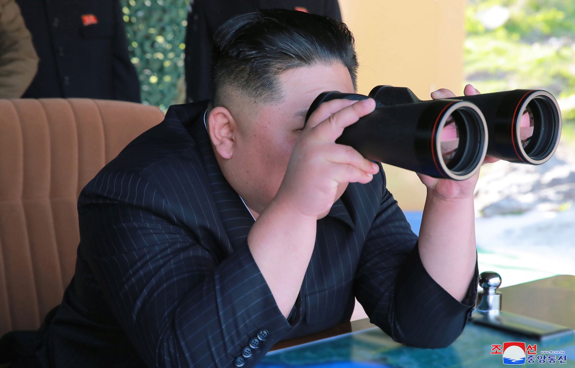 epa07559738 A photo released by the official North Korean Central News Agency (KCNA) shows Kim Jong Un, leader of the Democratic People's Republic of Korea reacts while overseeing the strike drill of military units at an undisclosed location in North Korea, 09 May 2019 (issued 10 May 2019).  EPA/KCNA   EDITORIAL USE ONLY