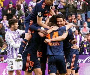 epa07582131 Valencia's players celebrate the team's classificaiton for the Champions League following a Spanish LaLiga soccer match between Valladolid and Valencia at the Jose Zorrilla stadium in Valladolid, Spain, 18 May 2019.  EPA/R. GARCIA