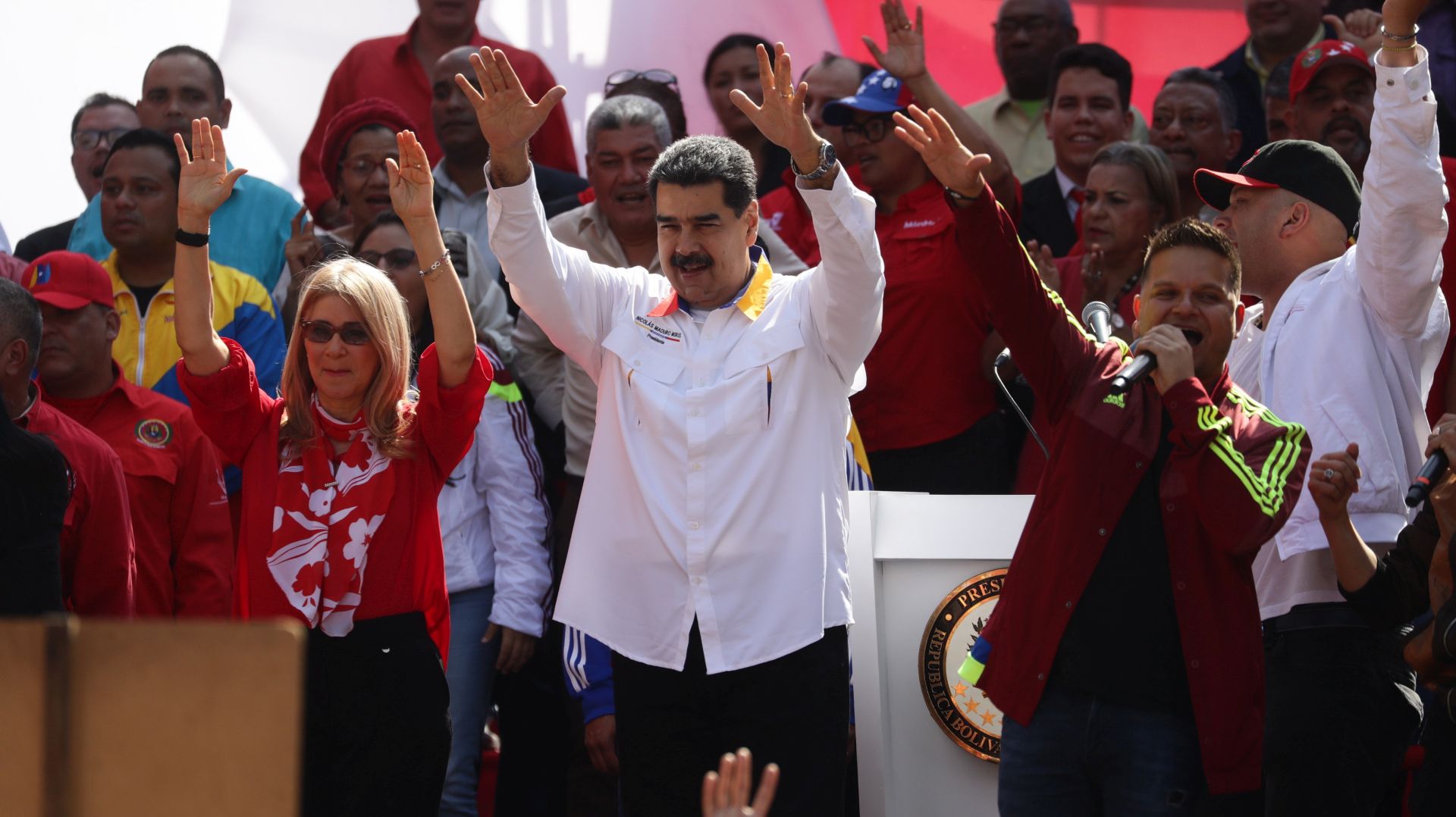 epa07587942 President of Venezuela Nicolas Maduro (C) and the first lady Cilia Flores (C-L) participate in an act of government to celebrate the first anniversary of the elections in Venezuela, of which Maduro proclaimed himself the winner, and that have not been recognized by the international community due to alleged irregularities, in Caracas, Venezuela, 20 May 2019.  EPA/Rayner Pena