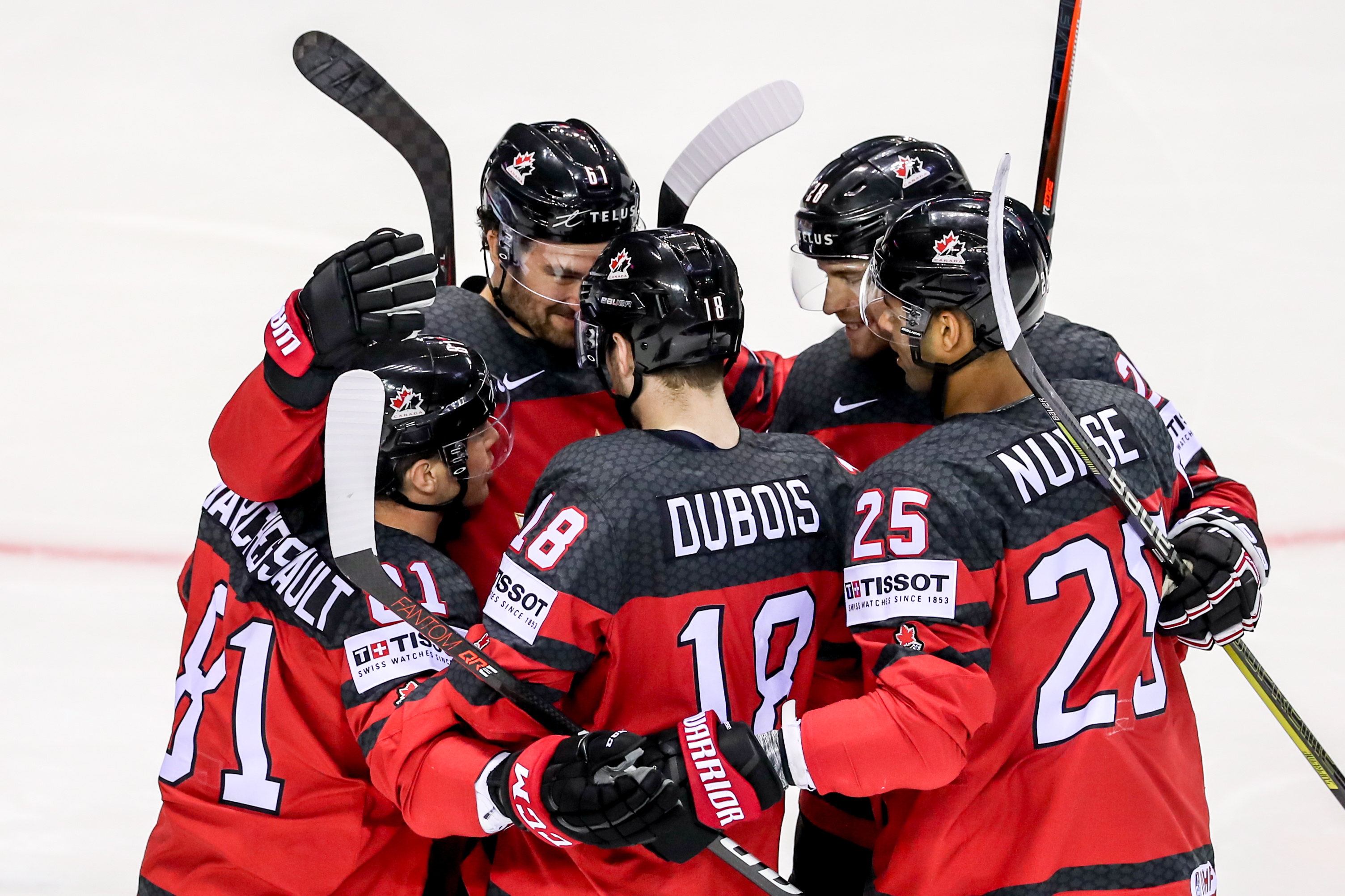 epa07590127 Players of Canda celebrate goal during the IIHF World Championship group A ice hockey match between Canada and USA at the Steel Arena in Kosice, Slovakia, 21 May 2019.  EPA/MARTIN DIVISEK