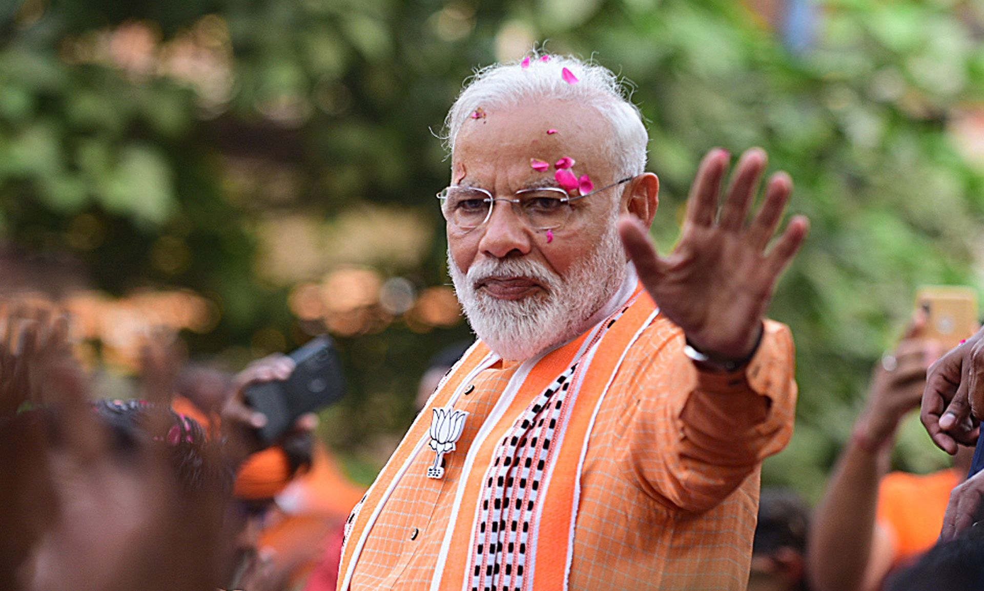 epa07594086 (FILE) - Top Bhartya Janta party (BJP) leader and Indian Prime Minister Narendra Modi waves to his supporters during a road show in Varanasi, Uttar Pradesh, India, 25 April 2019 (reissued 23 May 2019). According to reports, Modi's BJP party has won the Indian elections.  EPA/PRABHAT KUMAR VERMA